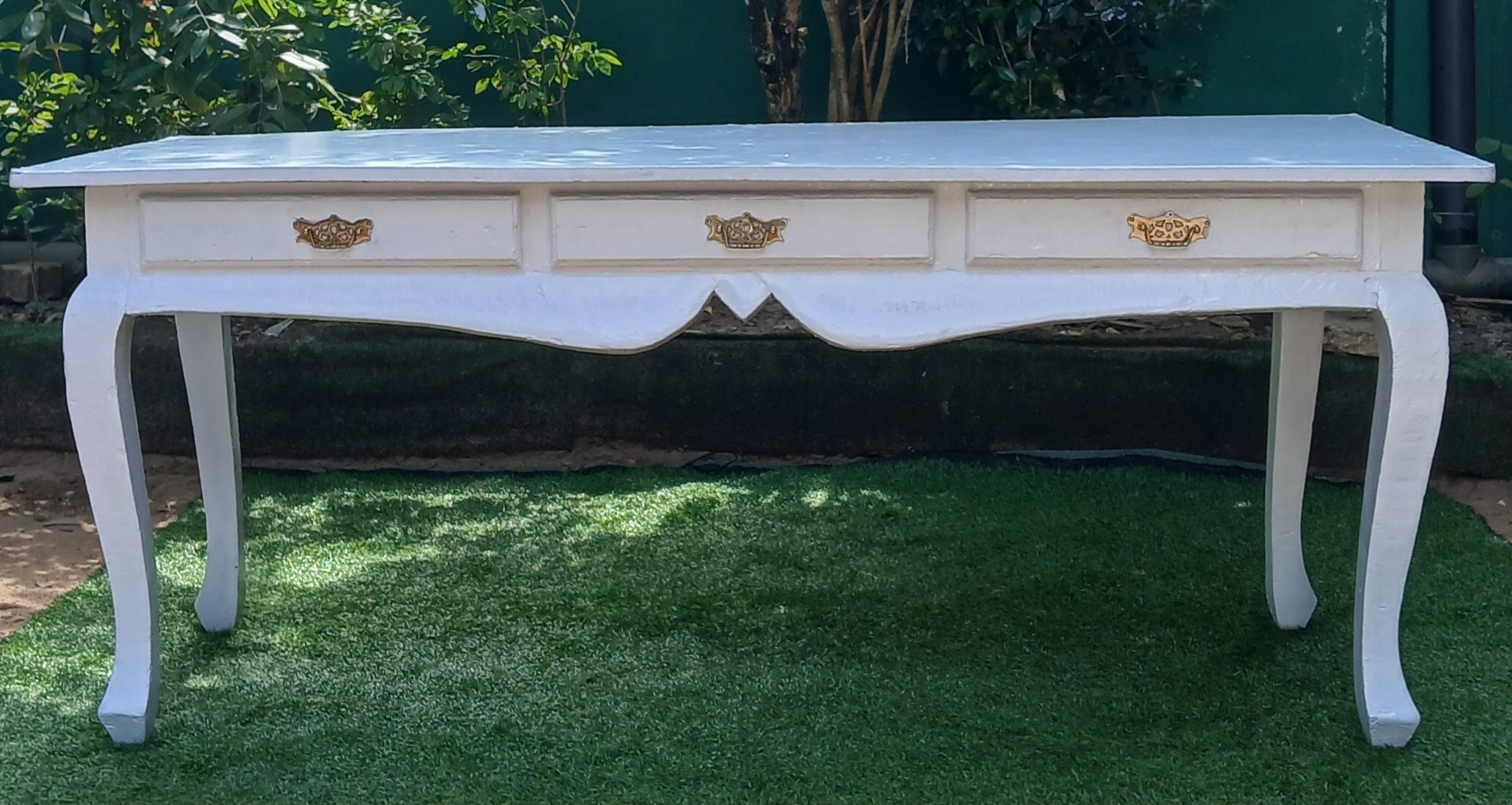 6 by 2.5 feet top
height 2.75 feet