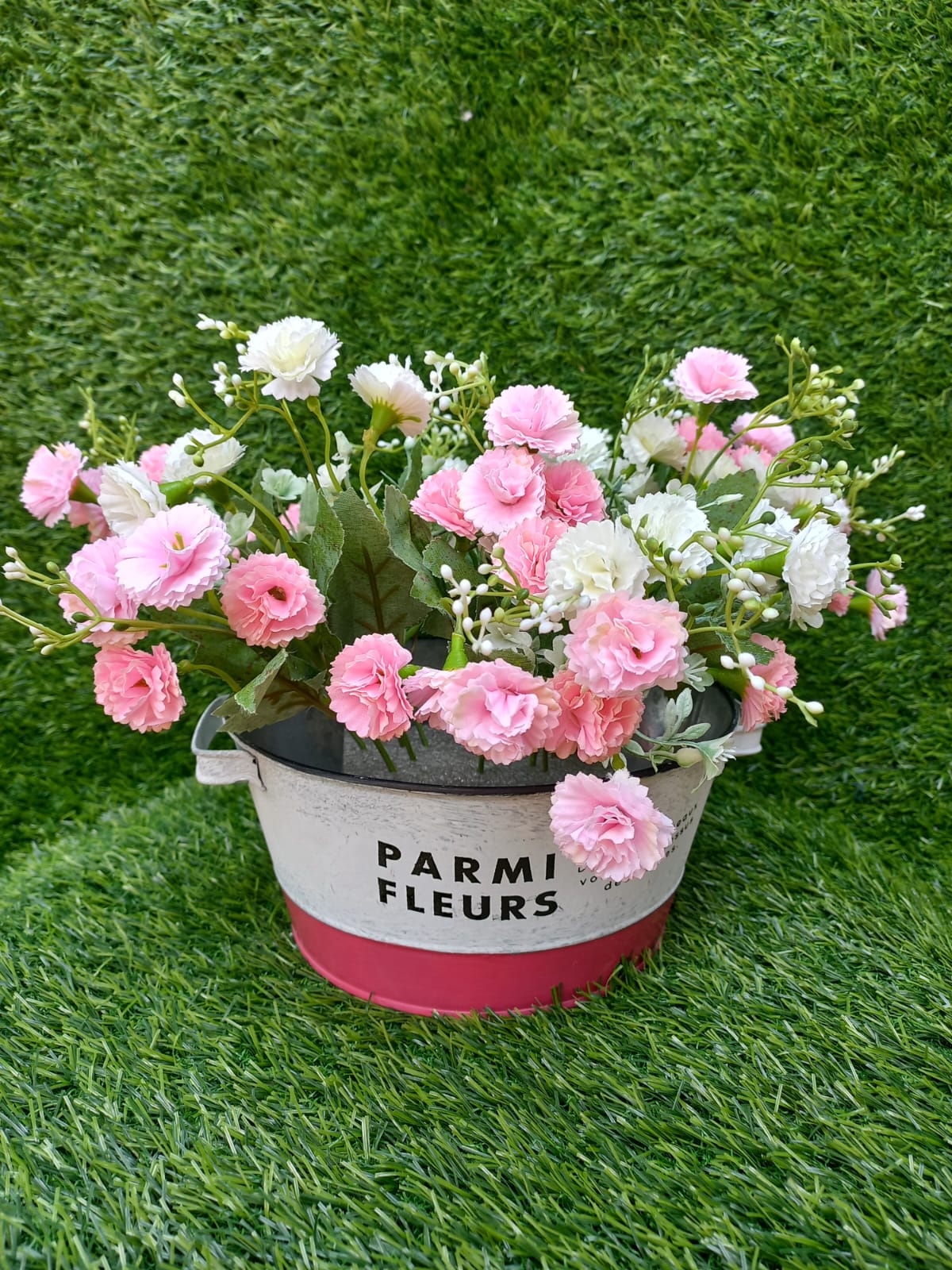 flat hot pink vase with pink white small flowers